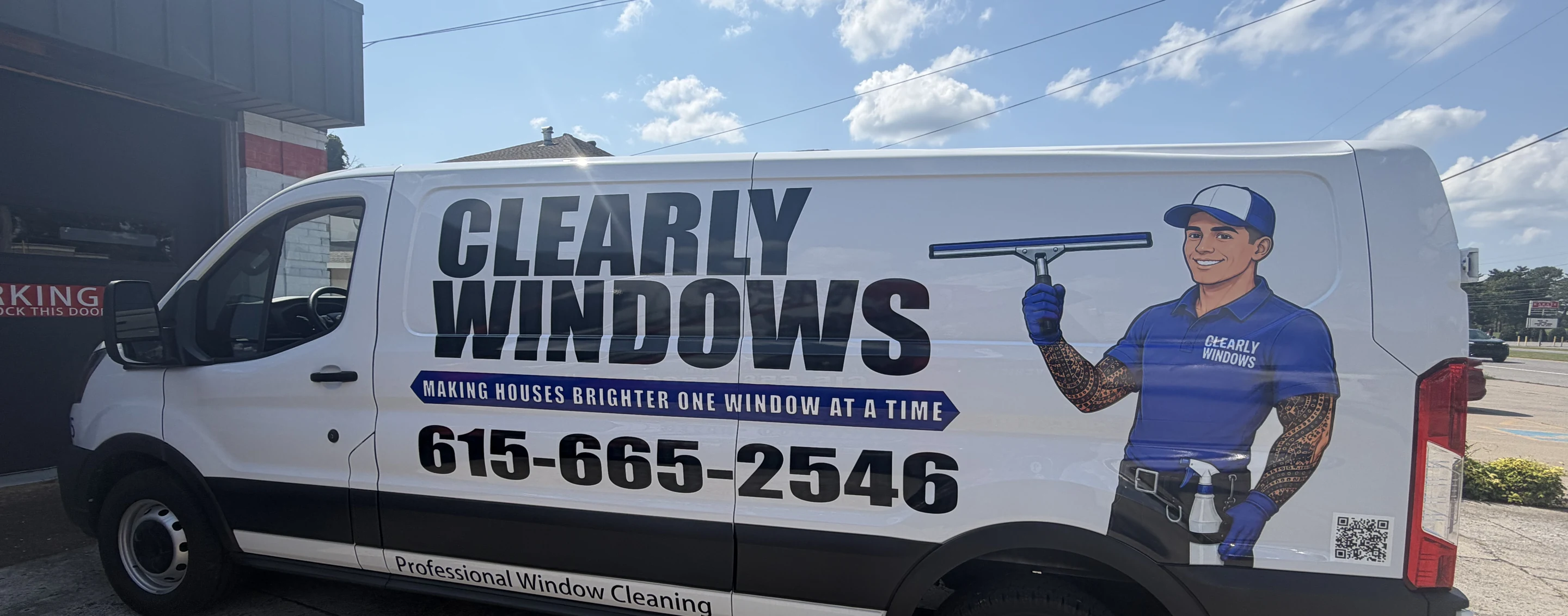 Clearly Windows service van wrapped in brand livery, parked outside the Murfreesboro shop