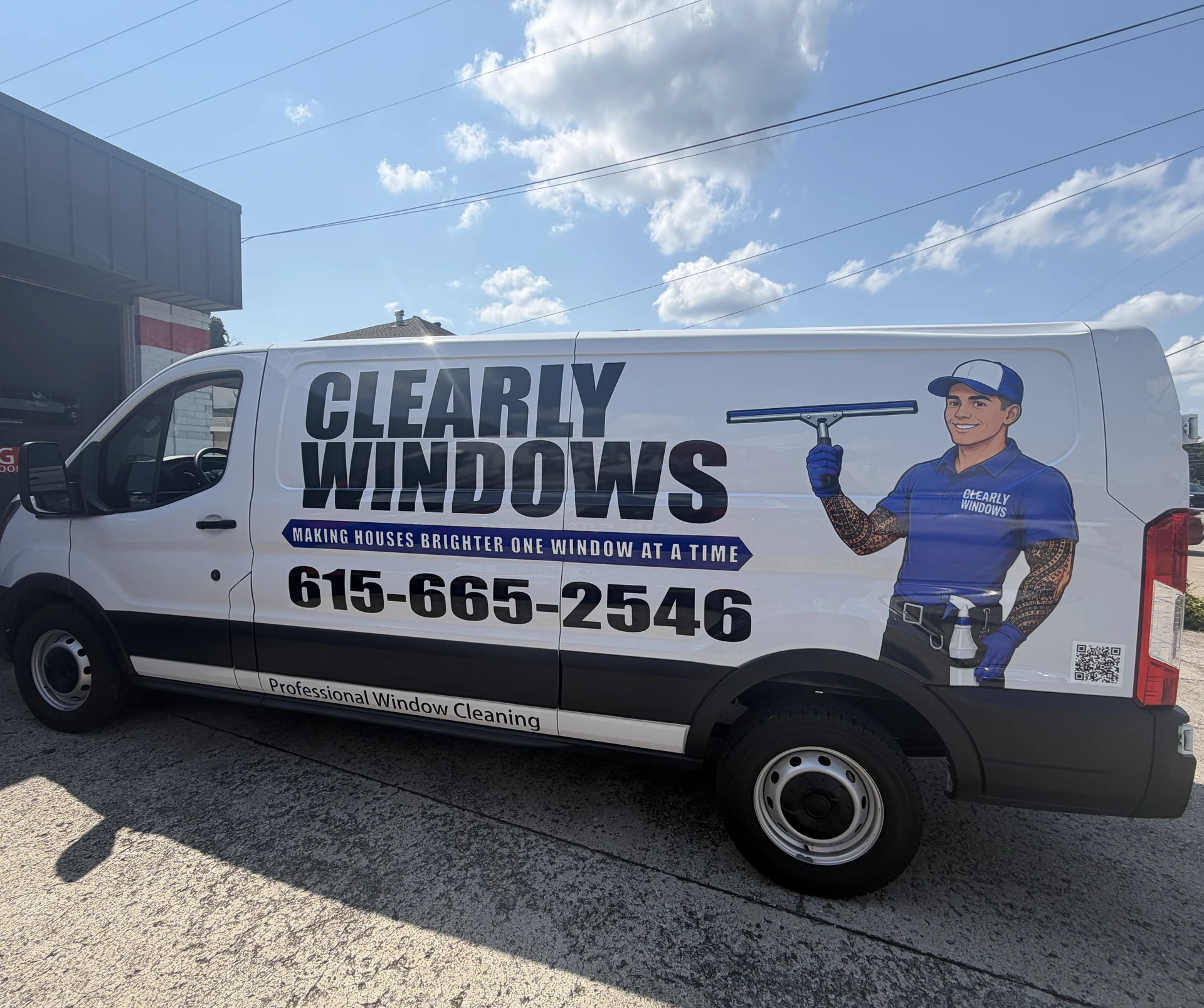 Clearly Windows service van wrapped in brand livery, parked at the Murfreesboro shop
